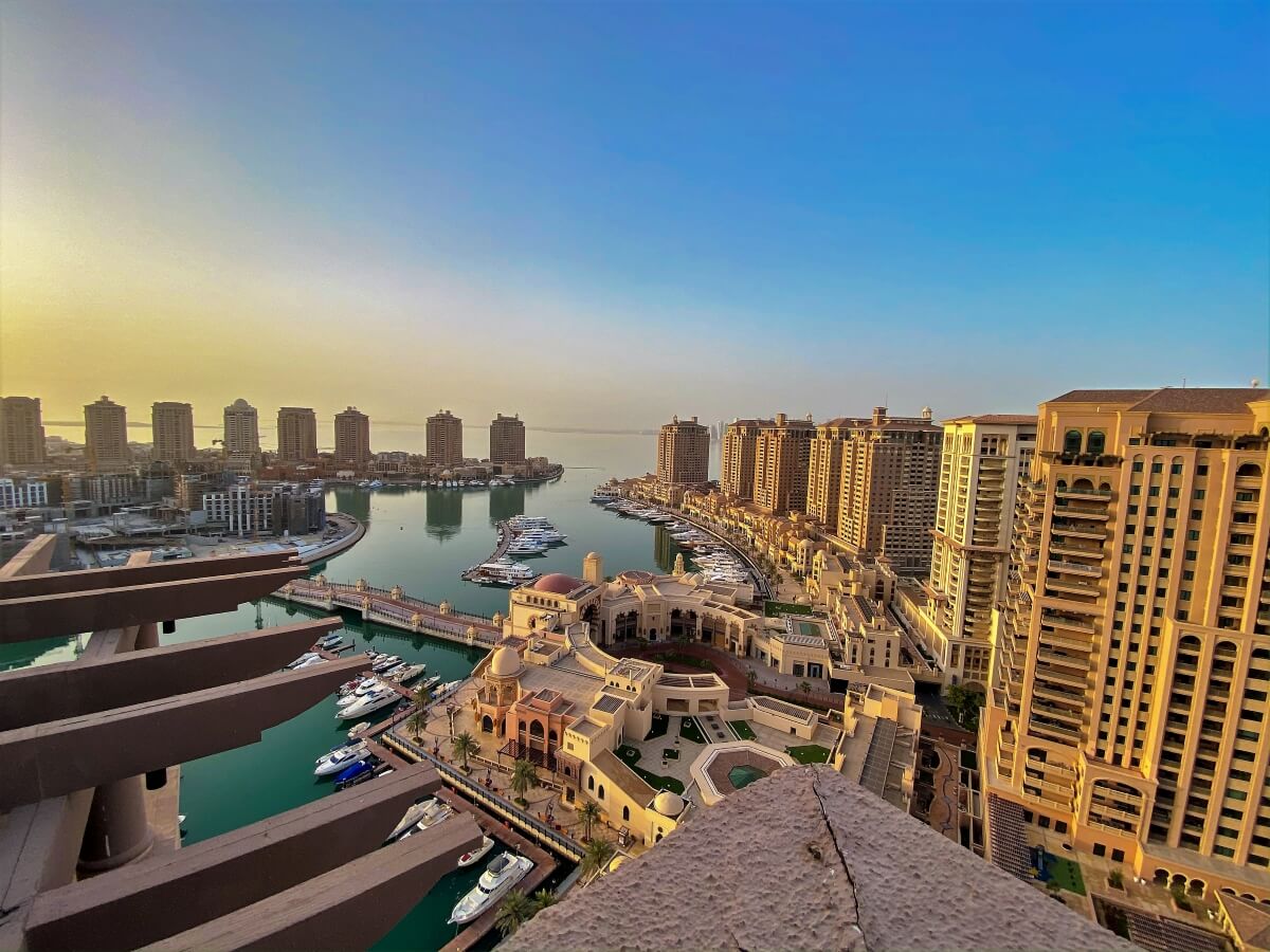 The Pearl marina area of Doha surrounded by sky scrapers