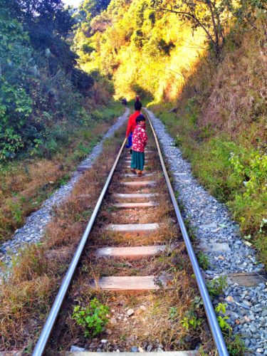 Hiking down the train tracks in rural Myanmar
