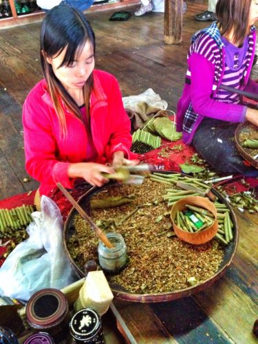 Watching a local girl make cigars