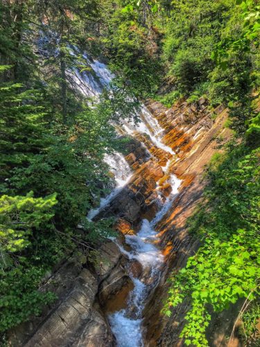Lower Bertha Falls waterfall in Waterton Lake National Park - one of the top hikes in Waterton Lakes National Park