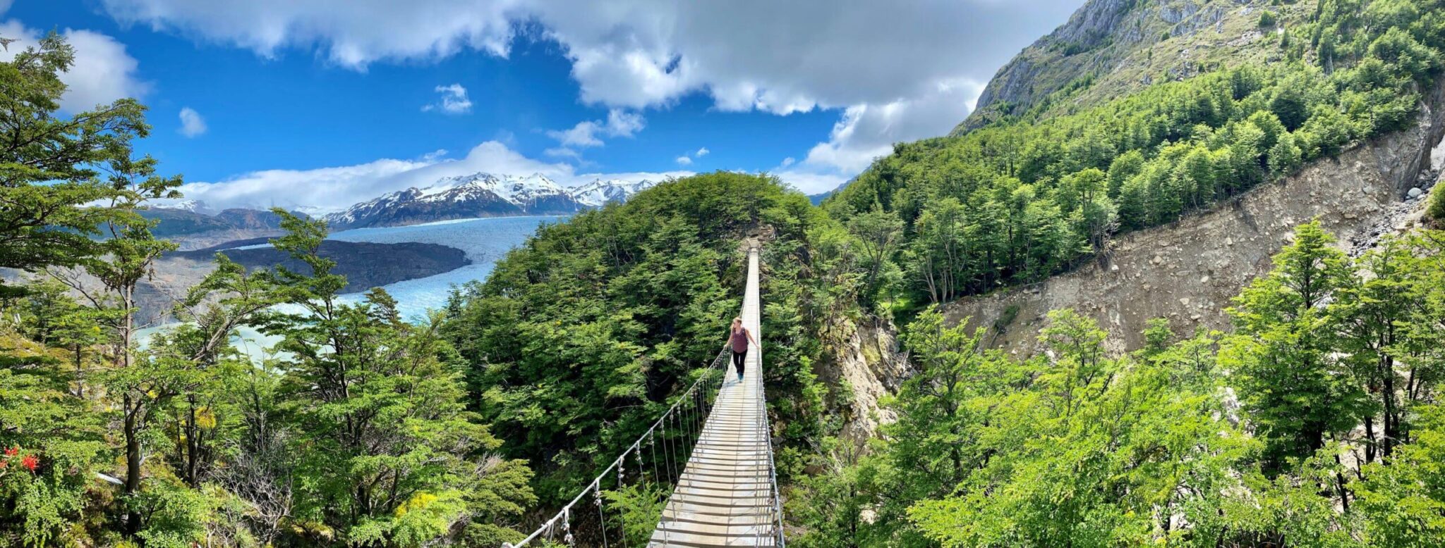 Crossing a hanging bridge in Patagonia - Torres del Paine, Chile