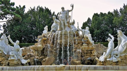 The Neptune Fountain featuring Neptune and a number of other figures and horses with water flowing