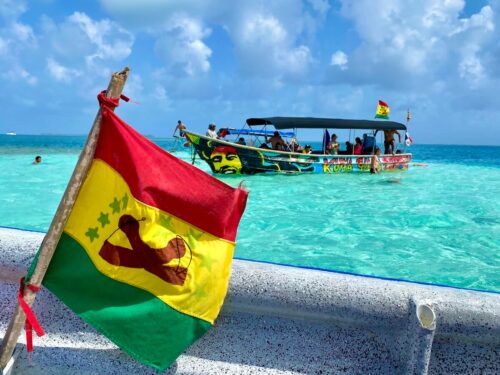 Perfect turquoise water and a colorful boat