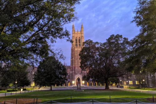 The outside of Duke Chapel at sunset