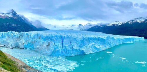 The giant Perito Moreno Glacier surrounded by mountains