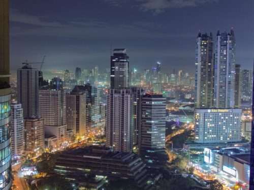 After dark city scape of Manila, Philippines